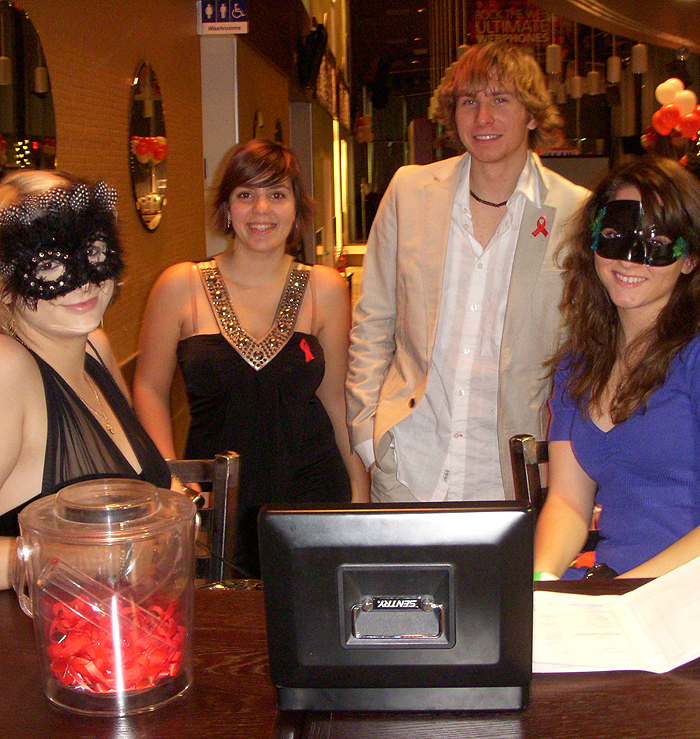Organizers welcome guests to the first Masquerade ball held at UTM. Photo courtesy SEC